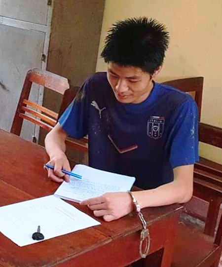 Nghi can Đỗ Mãnh Chiểu Minh tại cơ quan điều tra. Ảnh: Lam Sơn.