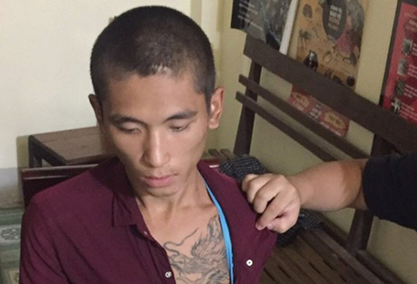 Lang Văn Tú tại cơ quan điều tra.