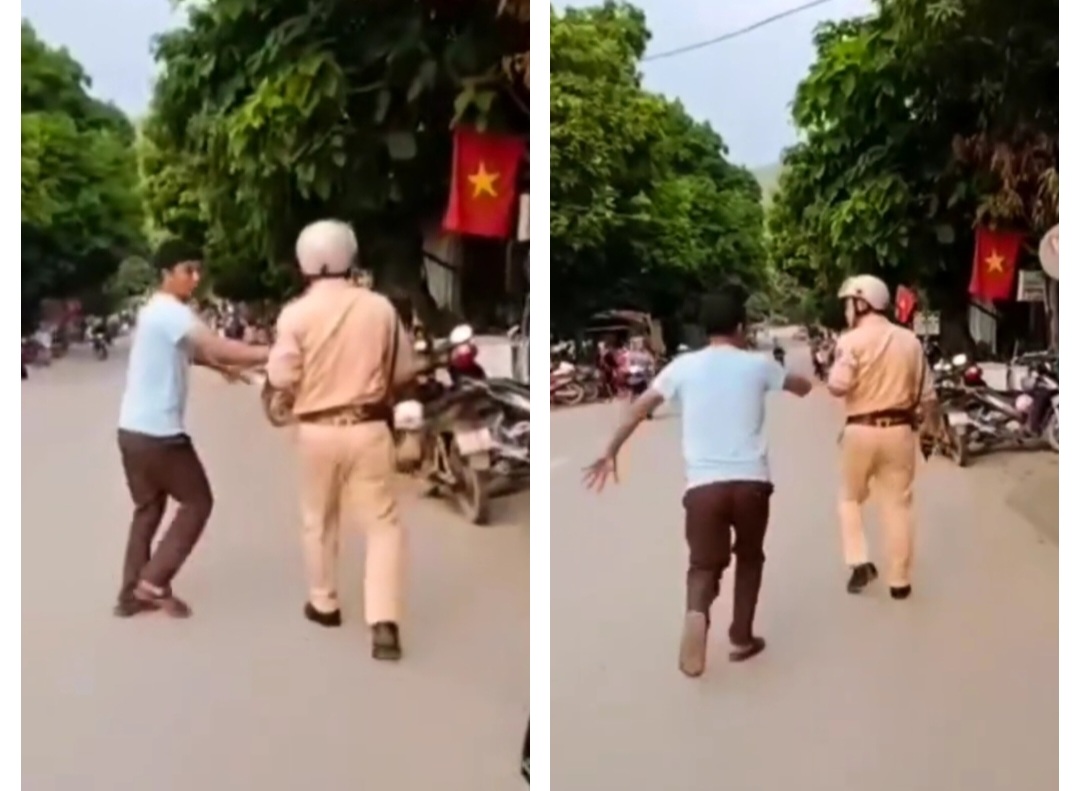Hà Giang: Video thanh niên không chấp hành kiểm tra nồng độ cồn, còn lao xe máy vào CSGT - Ảnh 1.