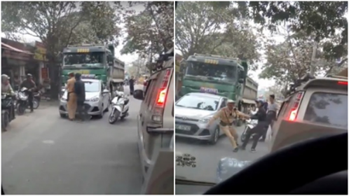 Hai người lao vào kéo chiến sỹ CSGT để xe vi phạm 