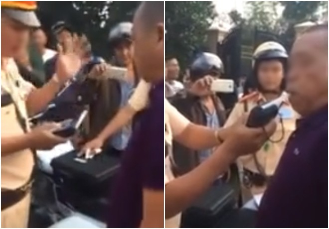 2 Chồng bị bắt xe, vợ chống tay chửi bới, xúc phạm