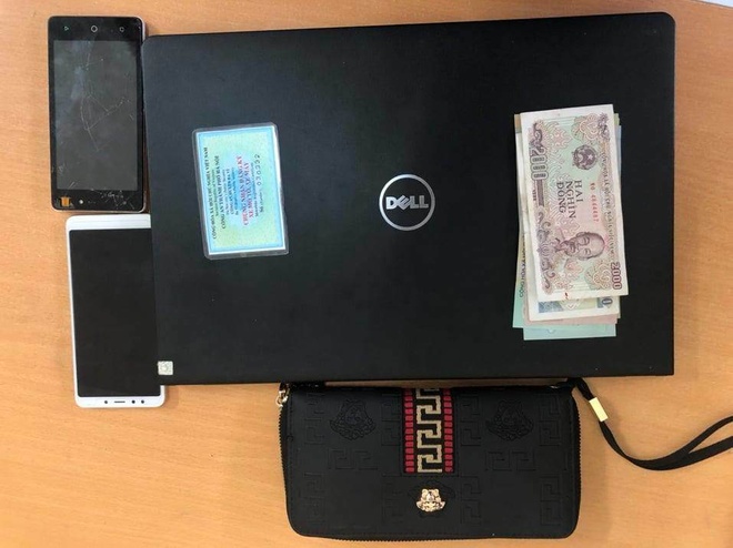 Trom may tinh cua cong an, co gai bi 141 bat giu hinh anh 1 